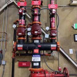 Coastwest Fire Protection - Installation of a new fire sprinkler riser manifold to supply 2 new systems & the original system at a commercial warehouse.