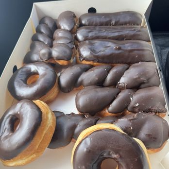 Randy's Donuts - Glaze Chocolate Long John with Cream & More - Donuts Near Me - Inglewood, California