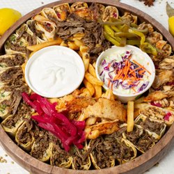 Zesty Pita & Burgers - Chicken and Beef Shawarma Saj Family Platters