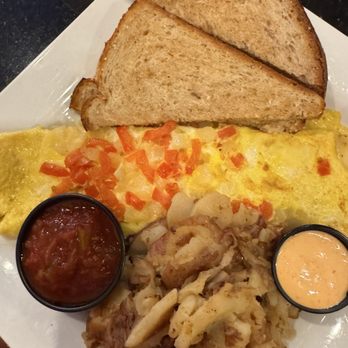 Keke's Breakfast Cafe - Southwestern Southwest Omelet with home fries and toast - Breakfast & Brunch Near Me - West Melbourne, Florida Keke's Breakfast Cafe - Southwestern Southwest Omelet with home fries and toast - Breakfast & Brunch Near Me - West Melbourne, Florida