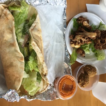Halal Corner - My falafel sandwich, with extra falafels and a side of cauliflower. - Halal Near Me - Austin, Texas