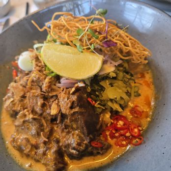 Pusadee's Garden - khao soi beef cheek, egg noodles, pickled mustard greens, red & yellow curry - Thai Near Me - Pittsburgh, Pennsylvania