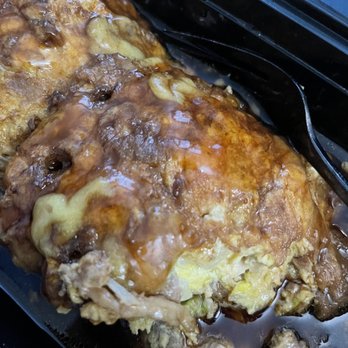 Golden Pot - Egg Foo Young combination with small plastic objects in it - Asian Fusion Near Me - Rowlett, Texas Golden Pot - Egg Foo Young combination with small plastic objects in it - Asian Fusion Near Me - Rowlett, Texas