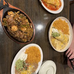 Three Meat Fajitas, Seafood Burrito, Chili Relleno and sides
