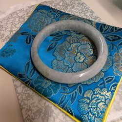 Bin Ching Jade Center - Grade A authentic Jade bangle, I love the grey/ bluish colors. Didn't want the traditional green jade