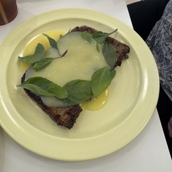 Happy Mediums - French toast pudding bread with lemon curd and basil - Breakfast & Brunch Near Me - Calimesa, California Happy Mediums - French toast pudding bread with lemon curd and basil - Breakfast & Brunch Near Me - Calimesa, California