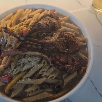Marley's Bar and Grill - Rasta Pasta with Lamb Chops - Salad Near Me - Hyattsville, Maryland