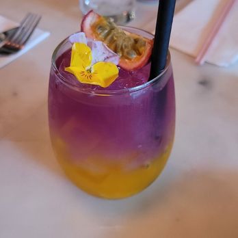 Bonjour Vietnam Bistro - Butterfly pea and passionfruit drink (non-alcoholic) $12 - Vietnamese Near Me - Vancouver, British Columbia Bonjour Vietnam Bistro - Butterfly pea and passionfruit drink (non-alcoholic) $12 - Vietnamese Near Me - Vancouver, British Columbia
