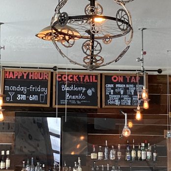KickStand Coffee & Kitchen - Bike part chandelier and view of the back bar © 2021 Karen Johanson - Coffee & Tea Near Me - Hood River, Oregon