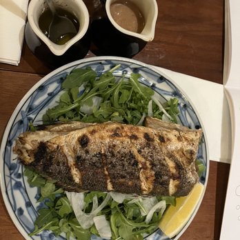 Yakitori Totto - Whole Branzino with arugula, miso and ponzu sauce. - Japanese Near Me - Somerville, Massachusetts