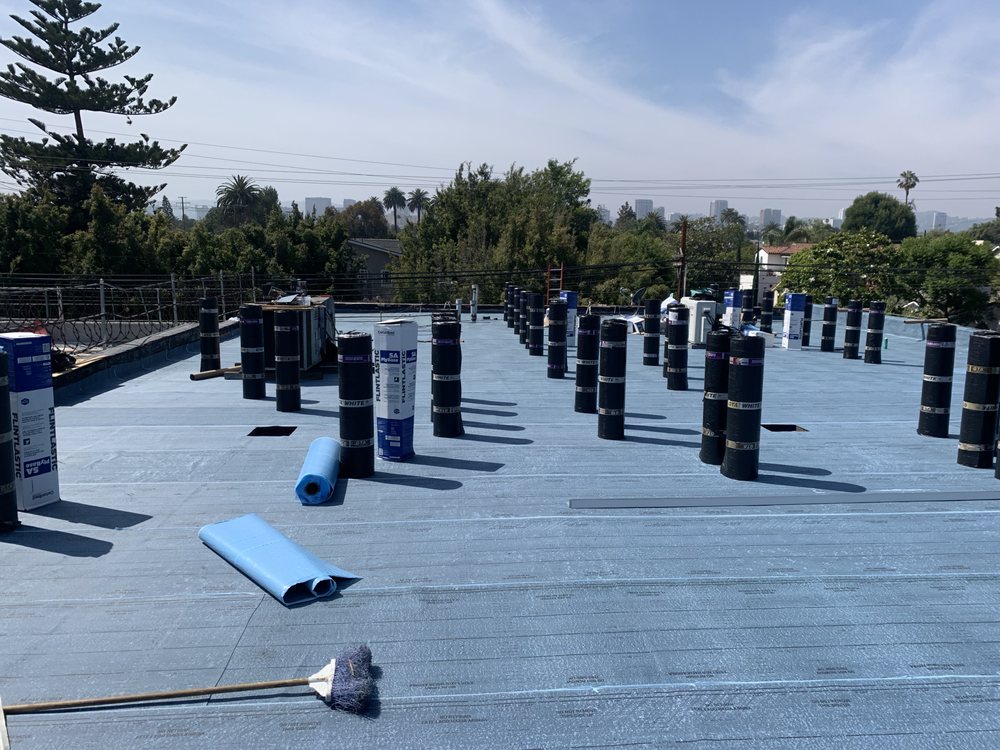 Slide of TopStamp Roofing