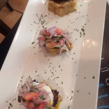Divino Ceviche - Quail Egg and Steak on Tacu Tacu Appetizer - Peruvian Near Me - Doral, Florida Divino Ceviche - Quail Egg and Steak on Tacu Tacu Appetizer - Peruvian Near Me - Doral, Florida