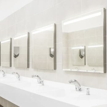 Emphasis Construction - a row of sinks in a public restroom - General Contractors Near Me Emphasis Construction - a row of sinks in a public restroom - General Contractors Near Me