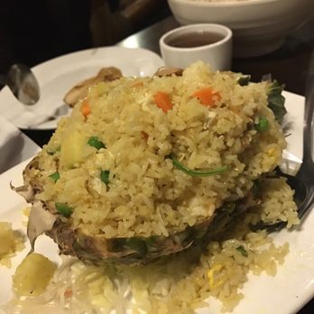 Penang - Pineapple Fried Rice served on a real pineapple! - Malaysian Near Me - Boston, Massachusetts