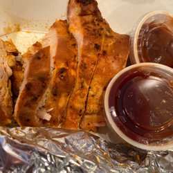 Nomad's BBQ - Smoked BBQ chicken snd BBQ sauce. Sorry, I ate a few slices already! So good!