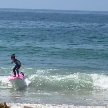 Surf Blessons - Cami standing up on her first day out! - Surf Schools Near Me - Hermosa Beach, California