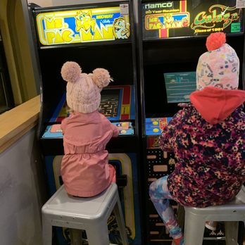 The Ripple Bar - two children playing a video game - Bars Near Me - Duluth, Minnesota