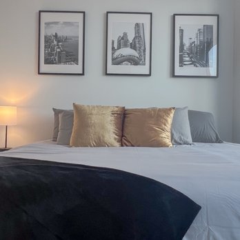 Lux Apartment Living - Bedroom of one of our furnished apartments - Vacation Rentals Near Me