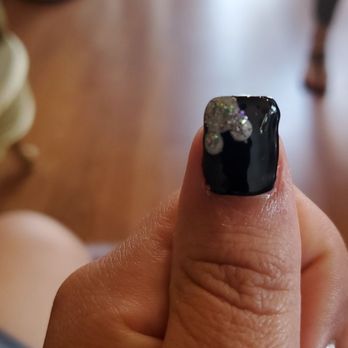7 Nail Spa - Gel nail polish on acrylic and the corner is all funny shaped - Nail Salons Near Me - Santa Rosa, California