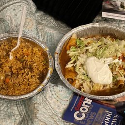 Rice and beans mixed along side Enchiladas Super Rancheras. Rice and beans mixed along side Enchiladas Super Rancheras.