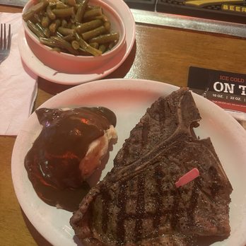 Logan's Roadhouse - The 16 OZ T Bone cooked medium rare. Mashed potatoes and gravy. Green beans. - Steakhouses Near Me - Jacksonville, North Carolina