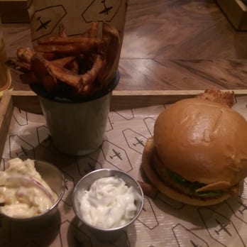 The Airport Pub - Catfish burger and sweet potato fries - Pubs Near Me - Gt Man, XGM