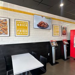 Mr. Wong's Chicken & Rice - Beltline Rd - Interior with artwork and front counter