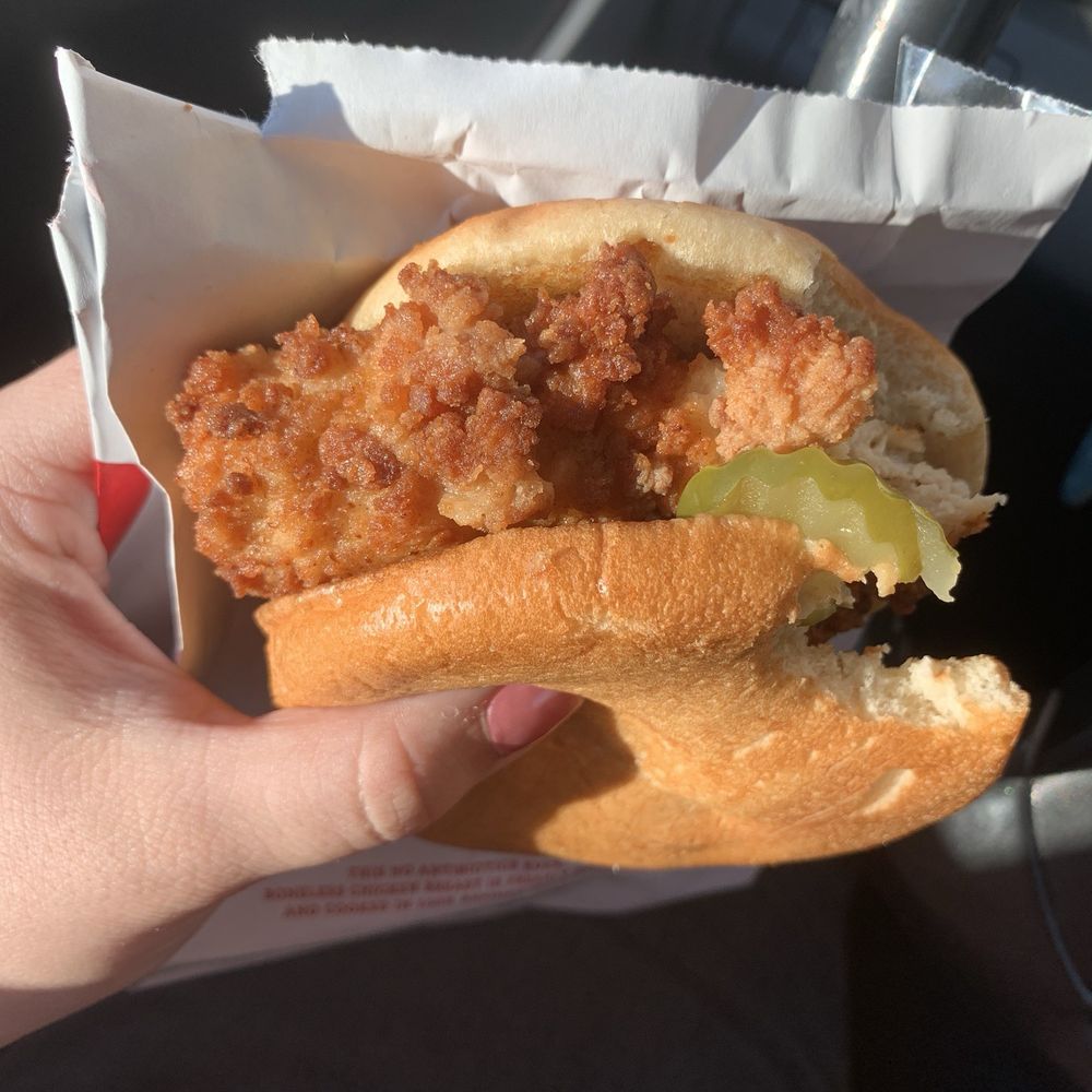 Chick-fil-A - ows a hand holding a sandwich - Fast Food Near Me - San Antonio, Texas Chick-fil-A - ows a hand holding a sandwich - Fast Food Near Me - San Antonio, Texas