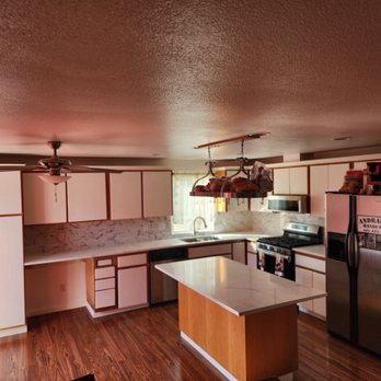 Andrades Handyman - a kitchen with wood floors - General Contractors Near Me Andrades Handyman - a kitchen with wood floors - General Contractors Near Me
