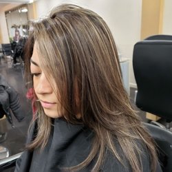 Blonde highlights on brown hair done by Lola