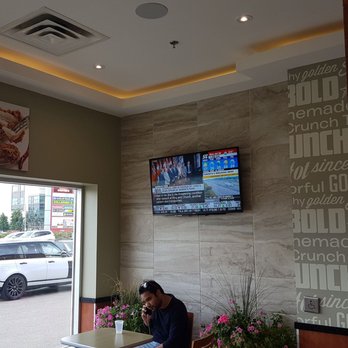 Church's Texas Chicken - Seating area w tv - Chicken Wings Near Me - Brampton, Ontario Church's Texas Chicken - Seating area w tv - Chicken Wings Near Me - Brampton, Ontario