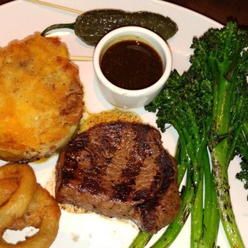 Yard House - Steak, baked potato, Broccoli, onion rings, roasted jalapeño and steak sauce - New American Near Me - San Antonio, Texas Yard House - Steak, baked potato, Broccoli, onion rings, roasted jalapeño and steak sauce - New American Near Me - San Antonio, Texas