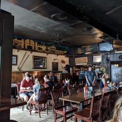 Zip's Cafe - Picture of happy people eating an awesome burger in this time capsule of an establishment.