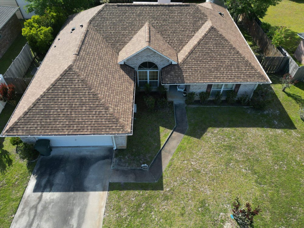 Slide of Talya Roofing