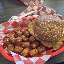 Tenderloin sandwich with tater tots. Tenderloin sandwich with tater tots.