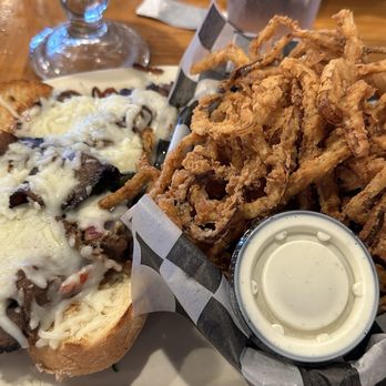 Captain’s Diner - Philly cheesesteak with onion rings. - Seafood Near Me - Corpus Christi, Texas