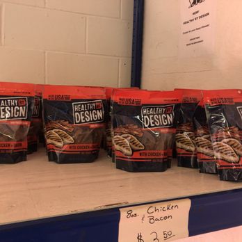 Simmons Chicken Store - a display of bags of dog food - Meat Shops Near Me - Decatur, Arkansas