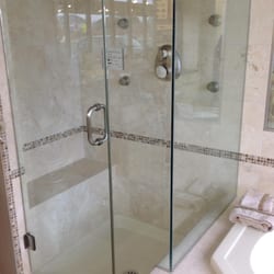4'X3' shower with tile seat and custom shower door
