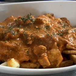 Boomtown Fusion Eatery - Butter chicken poutin