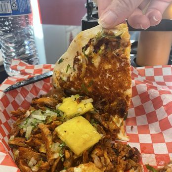 Top Taco - Gringa. Peeling back the tortilla to reveal the browned cheese goodness. - Tacos Near Me - Salt Lake City, Utah Top Taco - Gringa. Peeling back the tortilla to reveal the browned cheese goodness. - Tacos Near Me - Salt Lake City, Utah