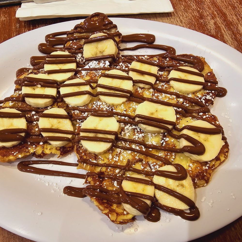 Nutella Cafe - Nutella croissant French toast with banana - Desserts Near Me - Chicago, Illinois Nutella Cafe - Nutella croissant French toast with banana - Desserts Near Me - Chicago, Illinois