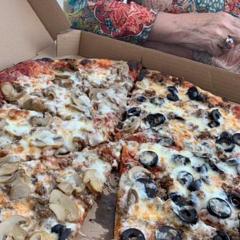 Amore's Pizza - Had to sample it before taking it home :) - Pizza Near Me - Anchorage, Alaska Amore's Pizza - Had to sample it before taking it home :) - Pizza Near Me - Anchorage, Alaska