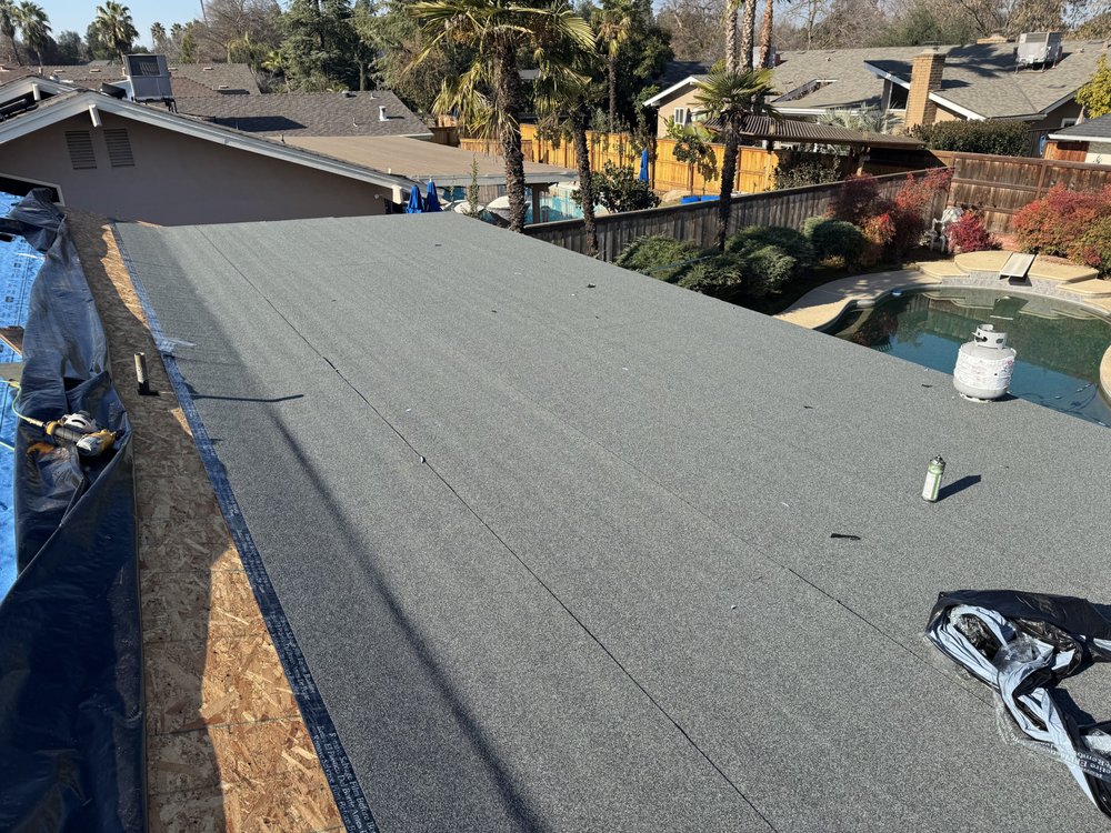 Slide of The Roofing Crew