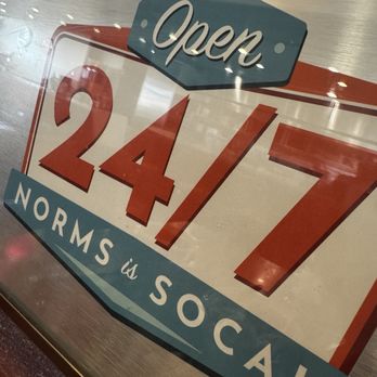NORMS Restaurant - Norms signage within a comfy booth setting - American Near Me - Huntington Beach, California