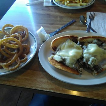 Ramsey's Coney Island - Philly Cheese With Onion Rings. Pretty Appetizing. - American Near Me - Southgate, Michigan Ramsey's Coney Island - Philly Cheese With Onion Rings. Pretty Appetizing. - American Near Me - Southgate, Michigan