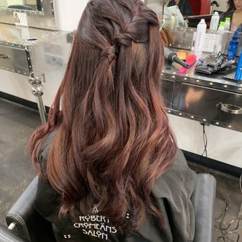 A Robert Cromeans Salon - Shampoo and blowout under yellow light - Hair Salons Near Me - San Diego, California