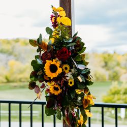 Blooms Reston Floral - Asymmetrical arbor arrangement 1