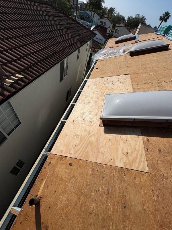 Slide of Vigil's Roofing