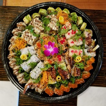 Jieyi Sushi - Awesome party tray that we enjoyed tonight. Beautiful and delicious at the same time! - Japanese Near Me - Chicago, Illinois Jieyi Sushi - Awesome party tray that we enjoyed tonight. Beautiful and delicious at the same time! - Japanese Near Me - Chicago, Illinois