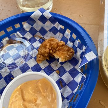 Watermark - chicken nugget in our coconut shrimp basket. - Cocktail Bars Near Me - New York, New York Watermark - chicken nugget in our coconut shrimp basket. - Cocktail Bars Near Me - New York, New York